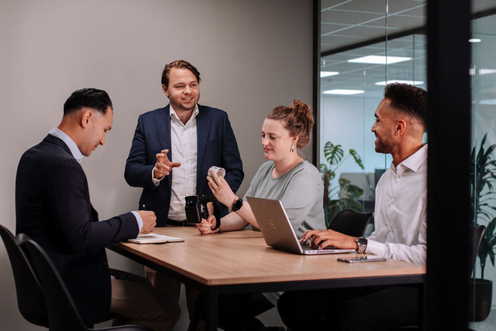 About us consulting team meeting