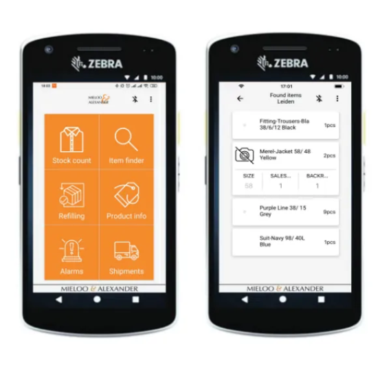 Two Zebra handheld mobile computers displaying the Mieloo & Alexander RFID inventory management app interface, featuring stock count dashboard and real-time item tracking for fashion retail.